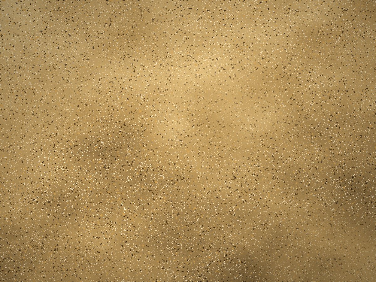 Granite surface in warm sand and amber tones